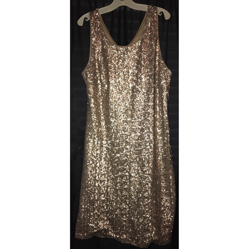 Gold body hugging sparkly cocktail dress